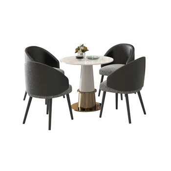 На масата за преговори в офиса на продажбите и стол с Модерен светъл луксозен мрамор малка кръгла маса в комбинация